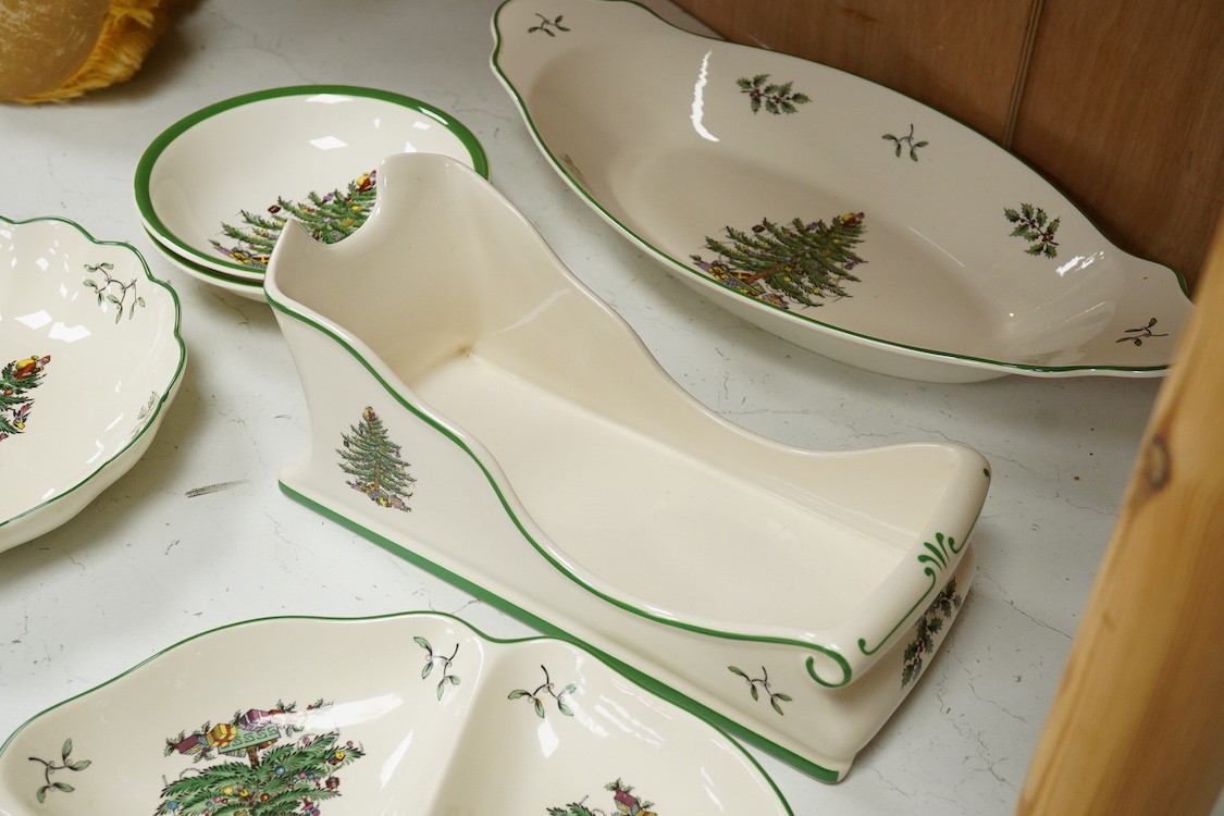 A Spode table service, Christmas Tree pattern. S 3324 to include a set of four bowls, platter and dishes, with some boxes, largest 36cm wide